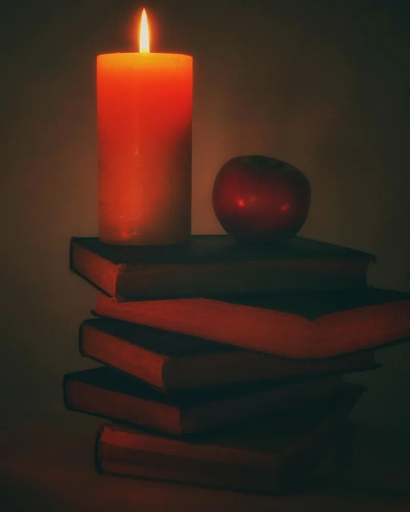 Candle book stack books